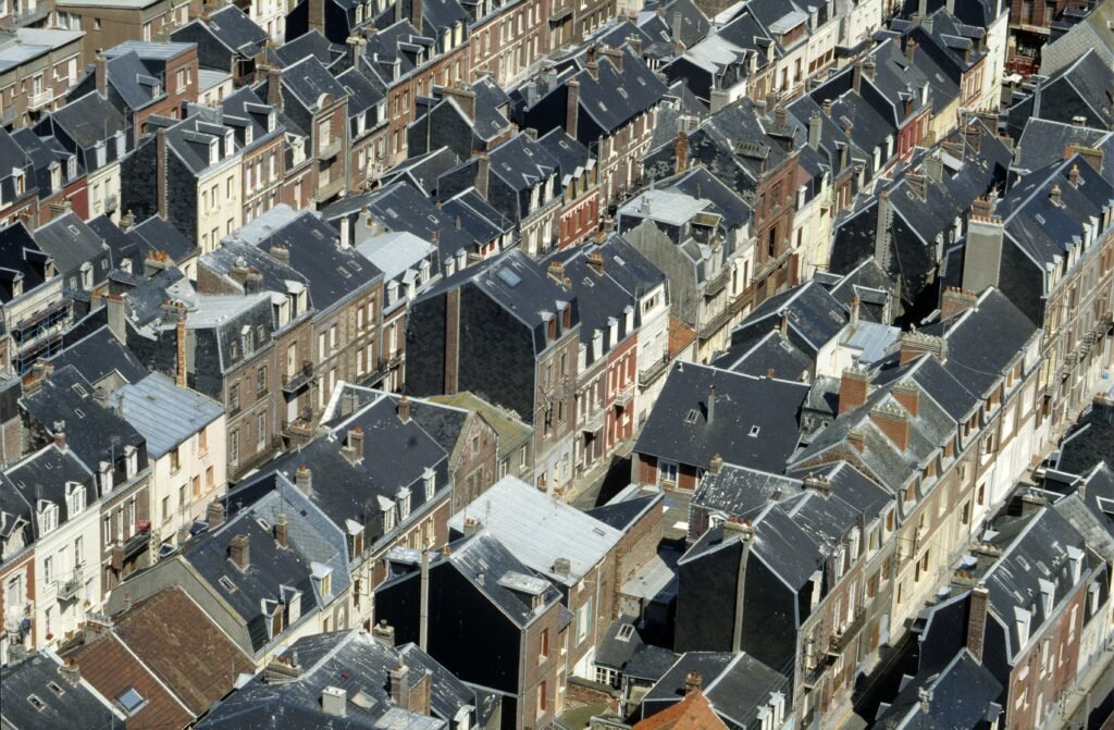 Aerial view showcasing the charming and historic rooftop architecture of Le Tréport, Normandie, France.